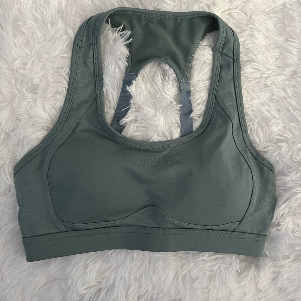 Gymshark sports bra in jade green worn 1x. Cut tag off size Medium.